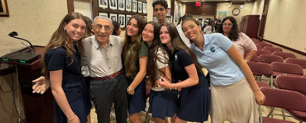 A photo of Grade 9 students posing with Waksal