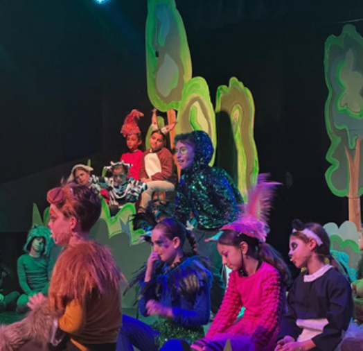 A photo of our lower school actors on stage - Credit: @scheckhillel on Instagram