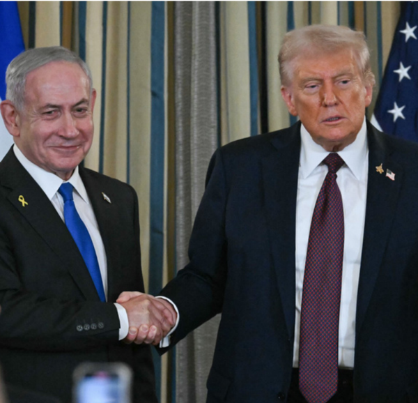An image of US President Trump and Israeli Prime Minister Netanyahu shaking hands - Credit: The Times of Israel