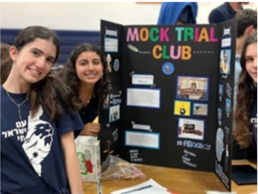 Photo of our mock trial club leaders presenting their club - Credit: @scheckhillel on Instagram