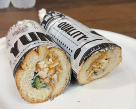 A photo of one of Feed Me's delicious schnitzel sandwiches! 