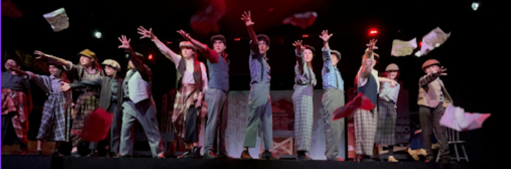 A group shot featuring all the Newsies 